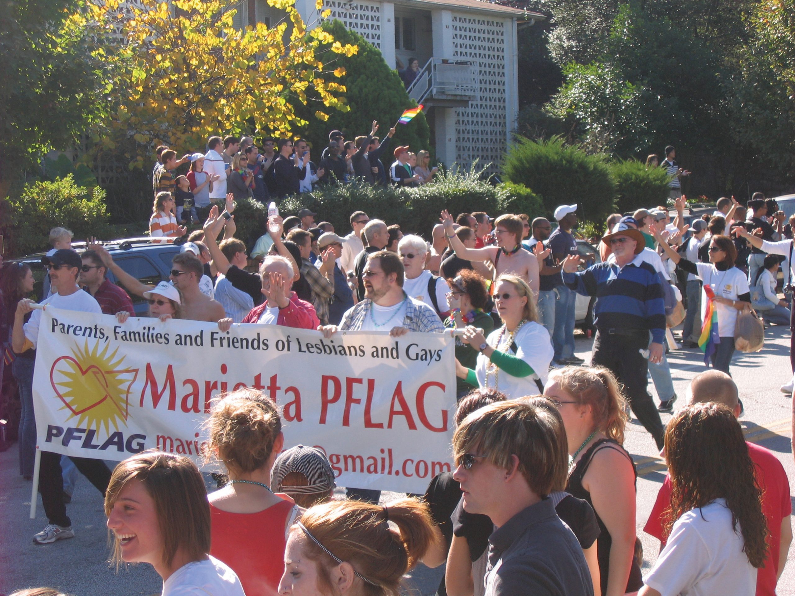 Photo of members of Marietta PFLAG marching in a parade