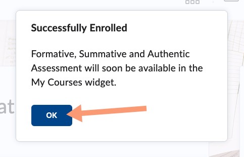 arrow points to OK button on the Successfully Enrolled message